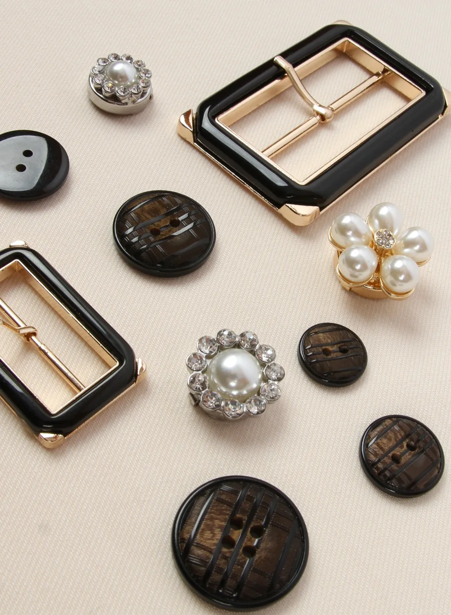 Decorative buttons, buckle and pearl trim from the BHR collection