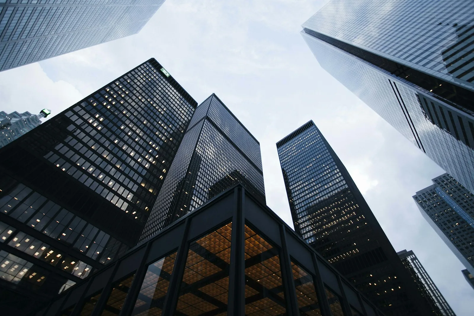 Modern corporate office towers in a global business district, illustrative photography